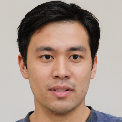 Neutral white young-adult male with short  black hair and brown eyes