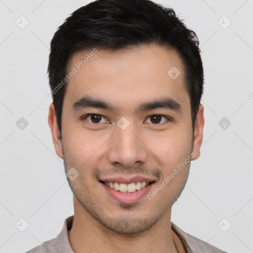 Joyful white young-adult male with short  black hair and brown eyes