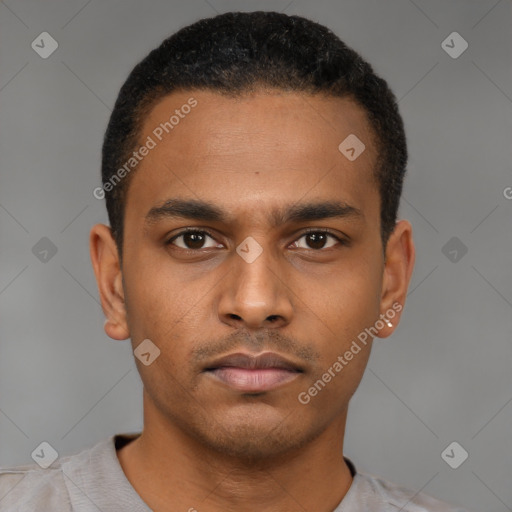 Neutral latino young-adult male with short  black hair and brown eyes