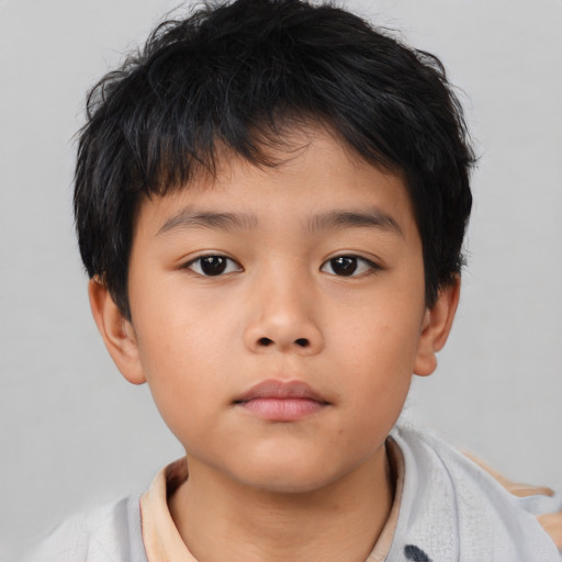 Neutral asian child male with short  brown hair and brown eyes