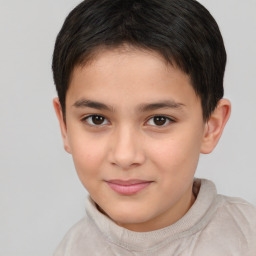 Joyful white child male with short  brown hair and brown eyes