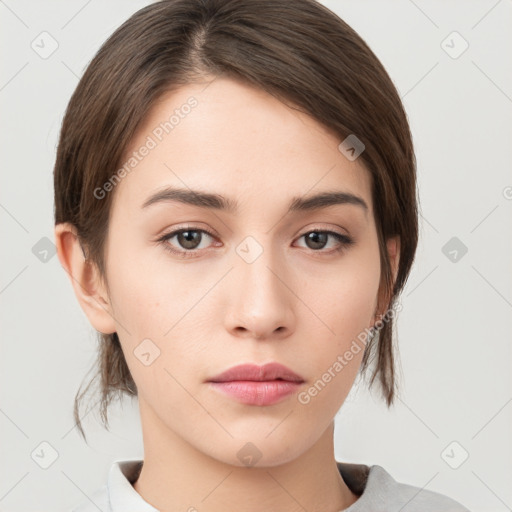 Neutral white young-adult female with medium  brown hair and brown eyes