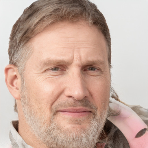 Joyful white middle-aged male with short  brown hair and grey eyes