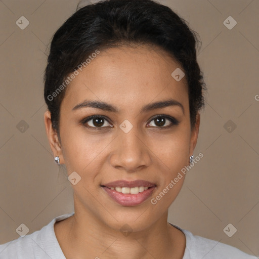 Joyful latino young-adult female with short  brown hair and brown eyes