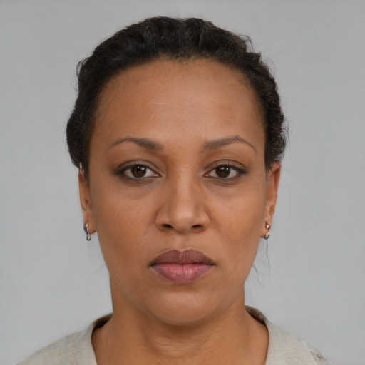 Neutral black young-adult female with short  black hair and brown eyes
