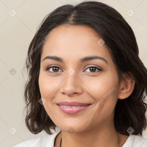 Joyful latino young-adult female with medium  brown hair and brown eyes