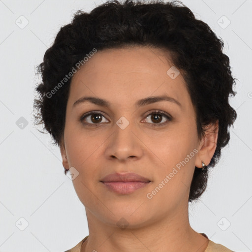 Joyful latino young-adult female with short  brown hair and brown eyes