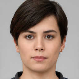 Neutral white young-adult female with short  brown hair and brown eyes