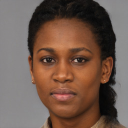 Neutral black young-adult female with short  black hair and brown eyes