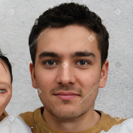 Neutral white young-adult male with short  brown hair and brown eyes