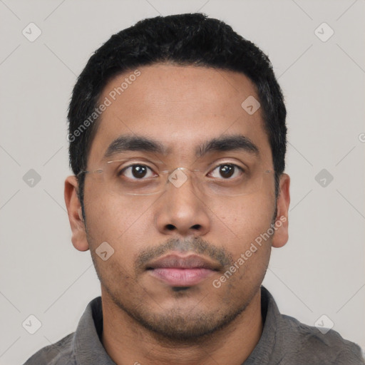 Neutral latino young-adult male with short  black hair and brown eyes