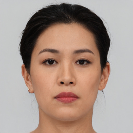 Neutral asian young-adult female with medium  black hair and brown eyes