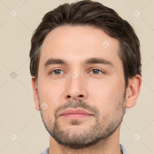 Neutral white young-adult male with short  brown hair and brown eyes