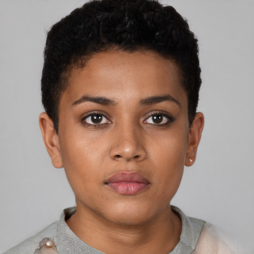 Neutral black young-adult female with short  brown hair and brown eyes