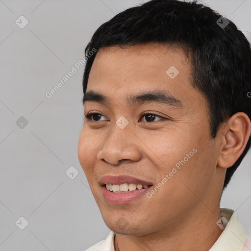 Joyful latino young-adult male with short  black hair and brown eyes