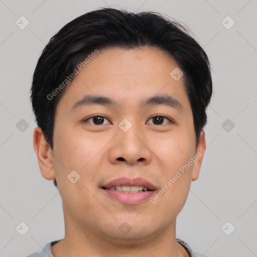 Joyful asian young-adult male with short  brown hair and brown eyes