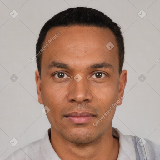 Neutral latino young-adult male with short  black hair and brown eyes