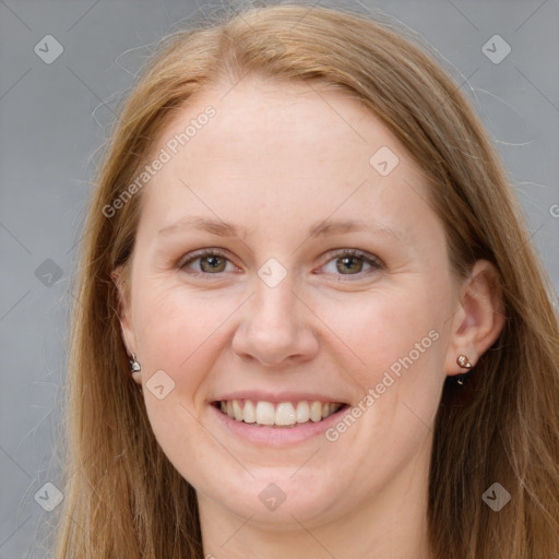 Joyful white young-adult female with long  brown hair and grey eyes