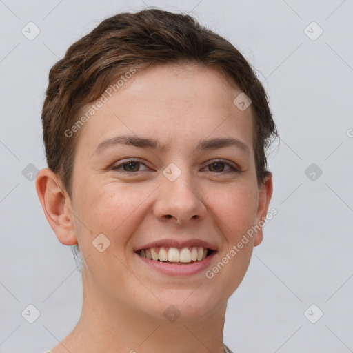 Joyful white young-adult female with short  brown hair and brown eyes