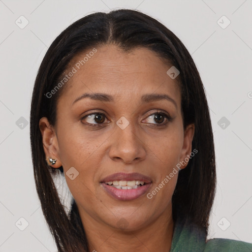 Joyful black adult female with medium  brown hair and brown eyes