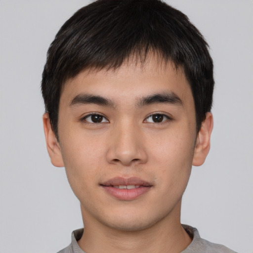 Neutral asian young-adult male with short  black hair and brown eyes