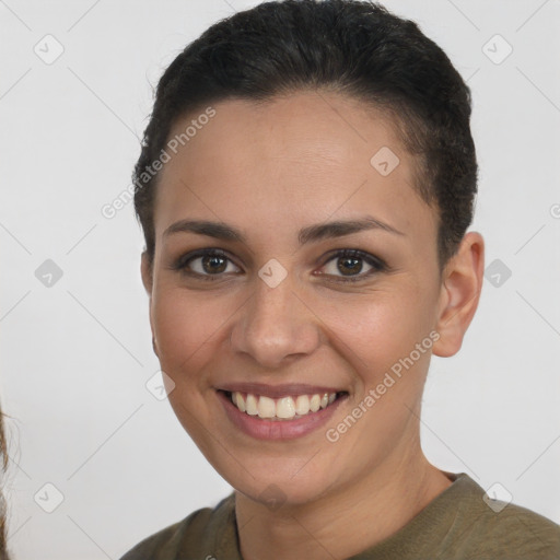 Joyful white young-adult female with short  brown hair and brown eyes