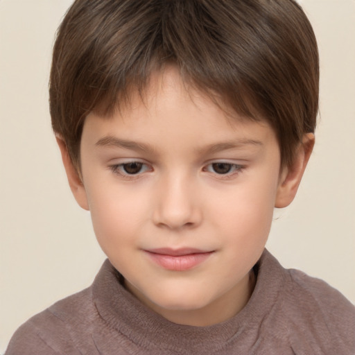 Joyful white child male with short  brown hair and brown eyes