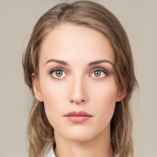 Neutral white young-adult female with medium  brown hair and green eyes