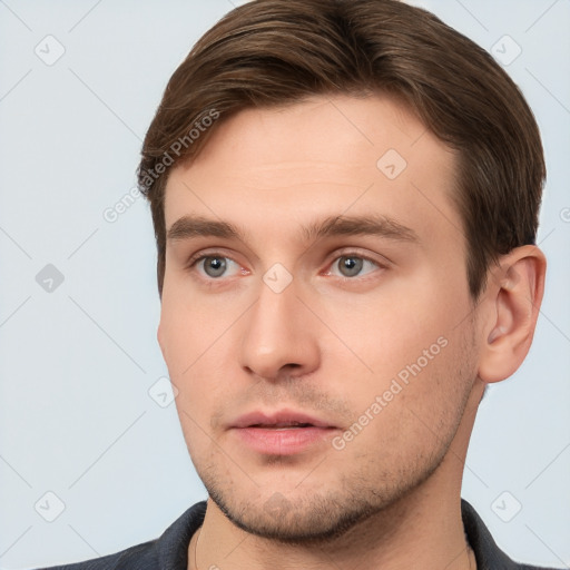 Neutral white young-adult male with short  brown hair and brown eyes