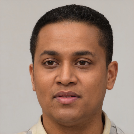 Neutral latino young-adult male with short  black hair and brown eyes