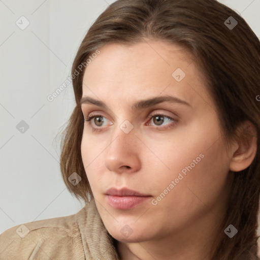 Neutral white young-adult female with long  brown hair and grey eyes