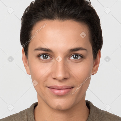 Joyful white young-adult female with short  brown hair and brown eyes