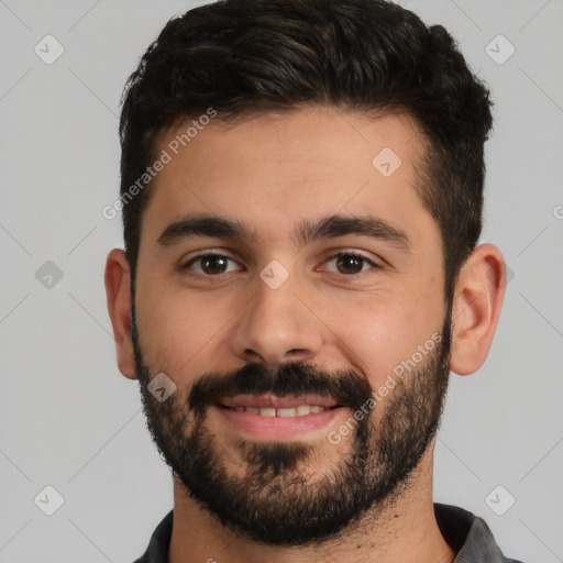 Joyful white young-adult male with short  brown hair and brown eyes