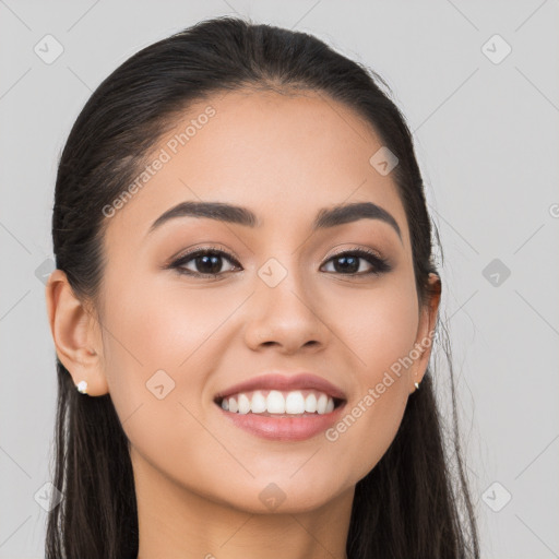 Joyful white young-adult female with long  brown hair and brown eyes