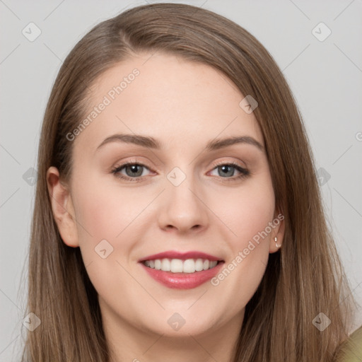 Joyful white young-adult female with long  brown hair and grey eyes