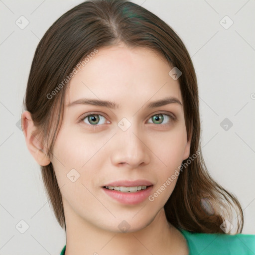 Joyful white young-adult female with medium  brown hair and green eyes