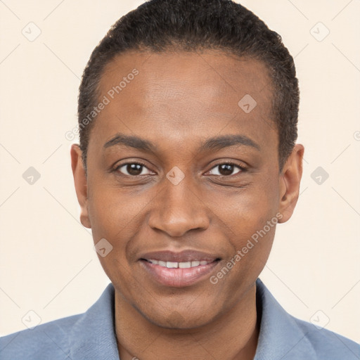 Joyful black young-adult male with short  brown hair and brown eyes