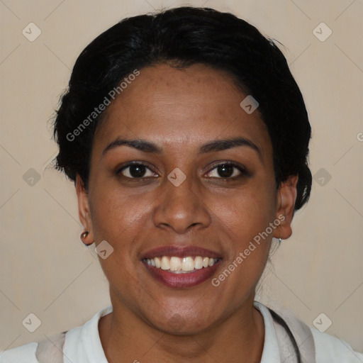 Joyful latino young-adult female with short  brown hair and brown eyes