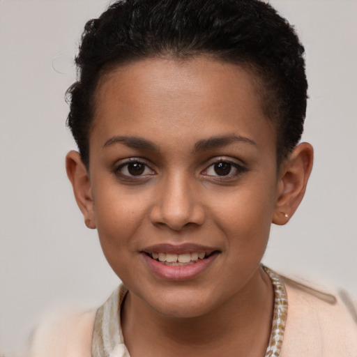 Joyful white young-adult female with short  brown hair and brown eyes