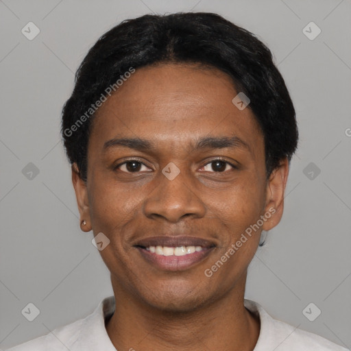 Joyful black young-adult male with short  black hair and brown eyes