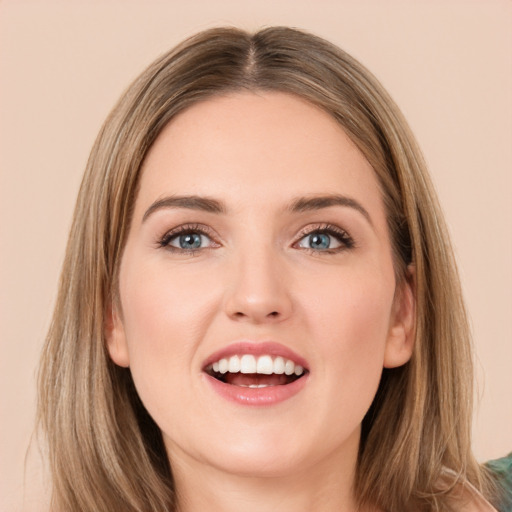 Joyful white young-adult female with long  brown hair and green eyes