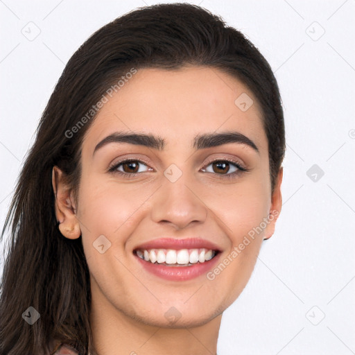 Joyful white young-adult female with long  brown hair and brown eyes