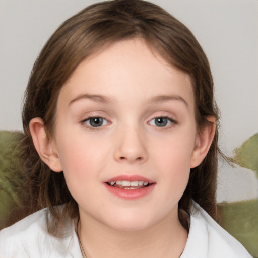 Joyful white child female with medium  brown hair and grey eyes