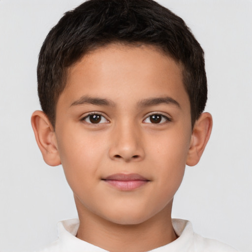 Joyful white child male with short  brown hair and brown eyes