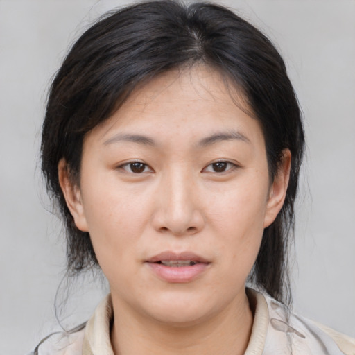 Neutral asian young-adult female with medium  brown hair and brown eyes