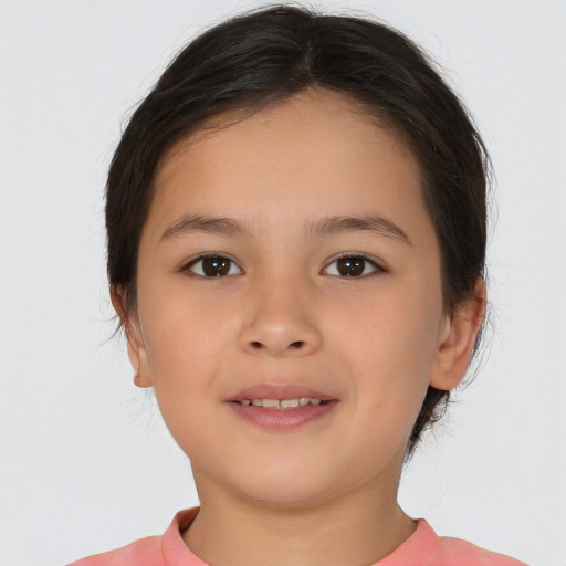 Joyful white child female with medium  brown hair and brown eyes