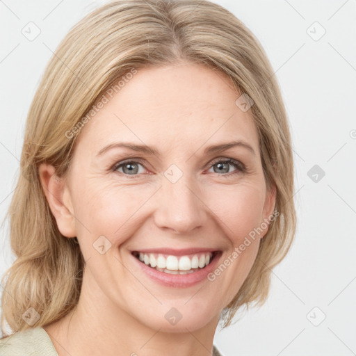 Joyful white young-adult female with medium  brown hair and blue eyes