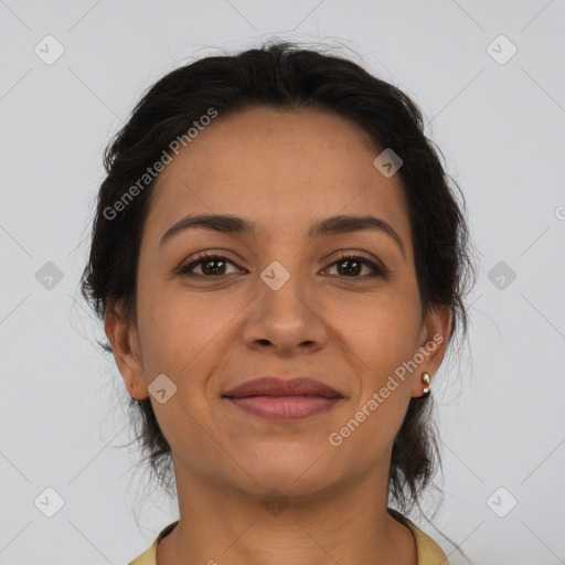 Joyful latino young-adult female with medium  brown hair and brown eyes