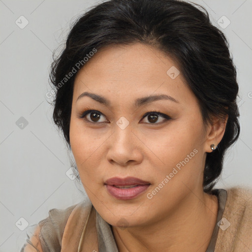 Joyful asian young-adult female with short  brown hair and brown eyes