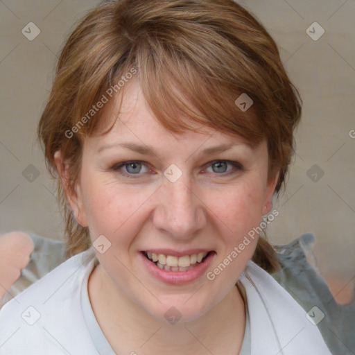 Joyful white young-adult female with medium  brown hair and blue eyes